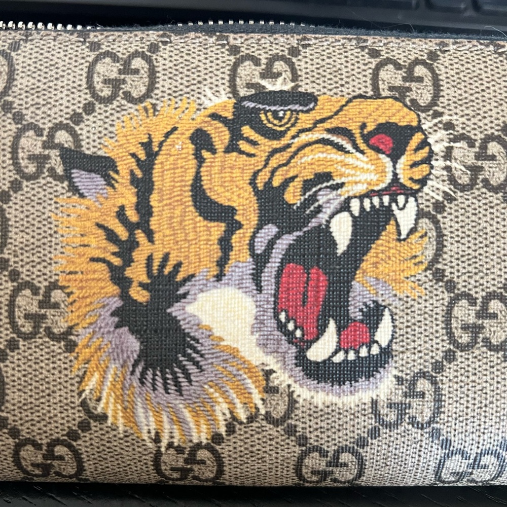 Gucci tiger wallet zip around printed gg coated canvas